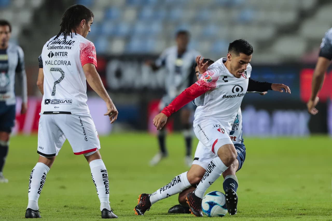 Con gol de Nacho Malcorra desde el punto penal, Atlas logra vencer a Pachuca 0-1 para romper una racha de 10 partidos sin ver la victoria.