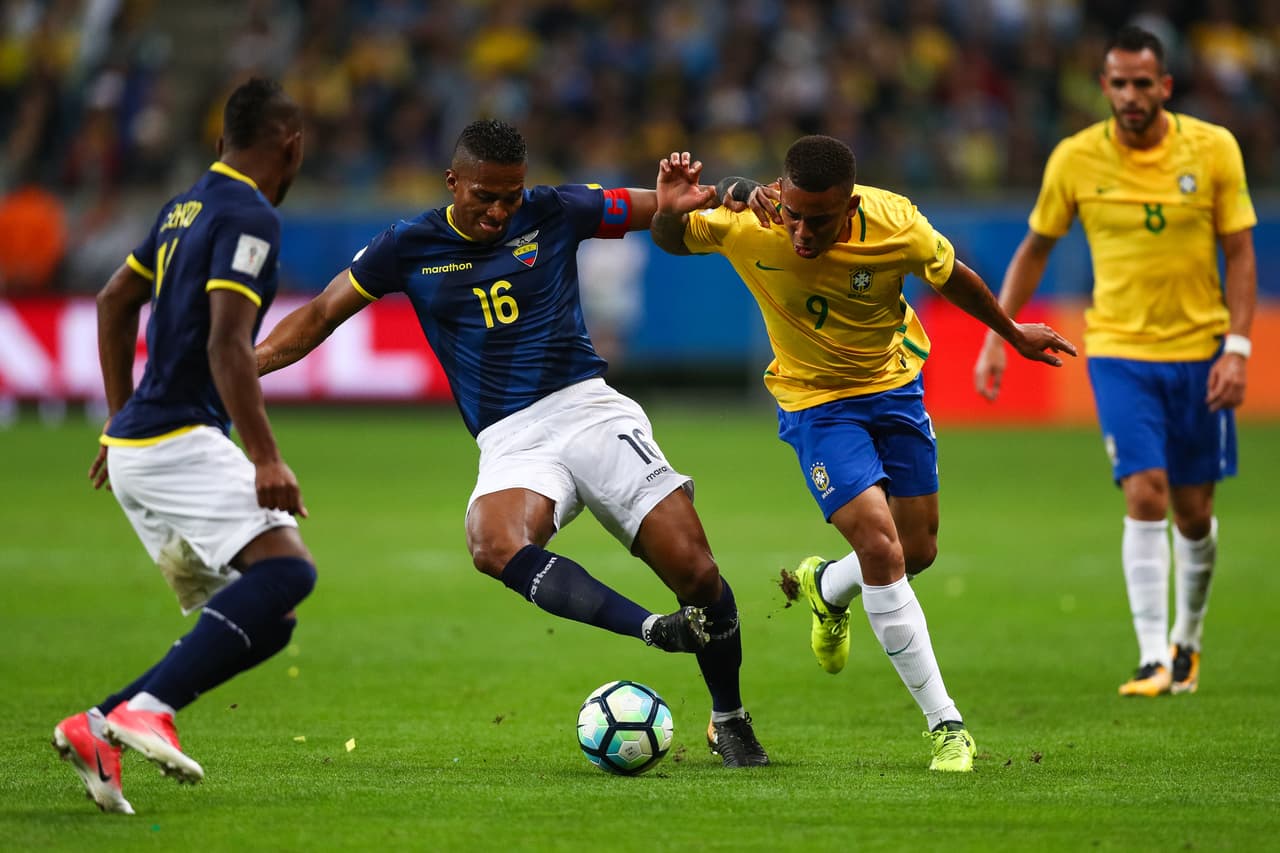 PORTO ALEGRE, BRAZIL - AUGUST 31: Gabriel Jesus (R) of Brazil struggles for the ball with Antonio Valencia of Ecuador during a match between Brazil and Ecuador as part of 2018 FIFA World Cup Russia Qualifier at Arena do Gremio on August 31, 2017 in Porto Alegre, Brazil. (Photo by Buda Mendes/Getty Images)