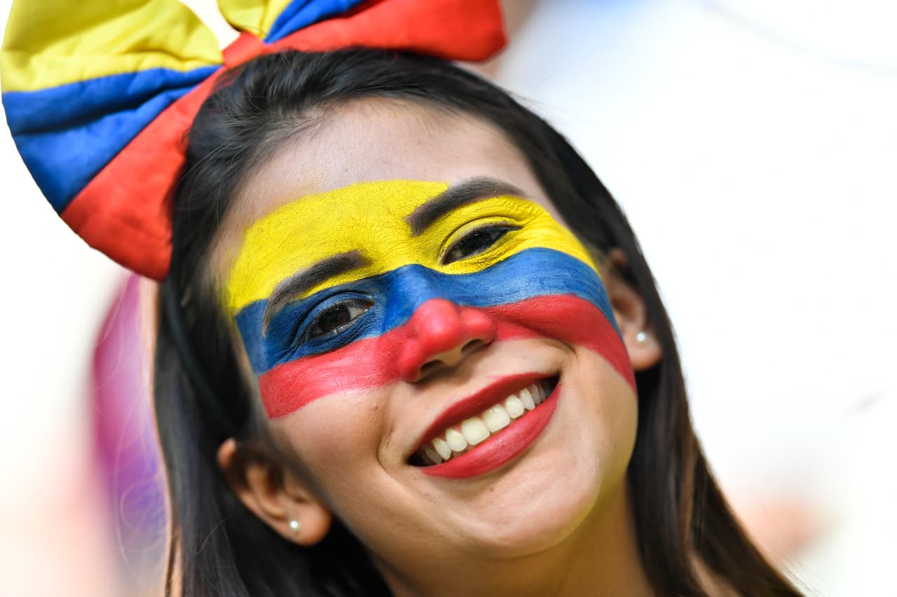 A Colombian fan waits for the start of the group H match between Senegal and Colombia, at the 2018 soccer World Cup in the Samara Arena in Samara, Russia, Thursday, June 28, 2018. (AP Photo/Martin Meissner)