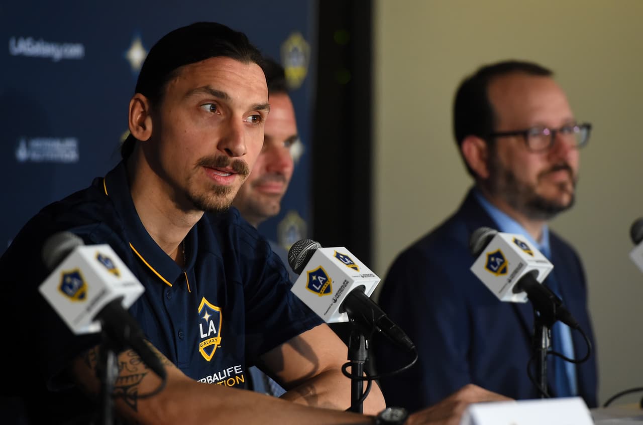 CARSON, CA - MARCH 30: Zlatan Ibrahimovic #9 of the Los Angeles Galaxy answers questions from the media as Team President Chris Klein, and President and CEO of AEG Dan Beckerman, look on during a press conference at StubHub Center on March 30, 2018 in Carson, California. (Photo by Jayne Kamin-Oncea/Getty Images)
