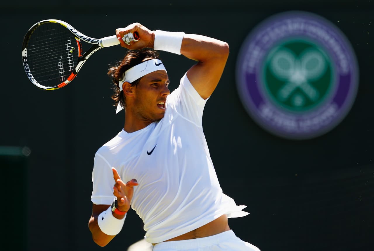 LONDON, ENGLAND - JUNE 30: Rafael Nadal of Spain in action in his Gentlemens Singles first round match against Thomaz Bellucci of Brazil during day two of the Wimbledon Lawn Tennis Championships at the All England Lawn Tennis and Croquet Club on June 30, 2015 in London, England. (Photo by Julian Finney/Getty Images)