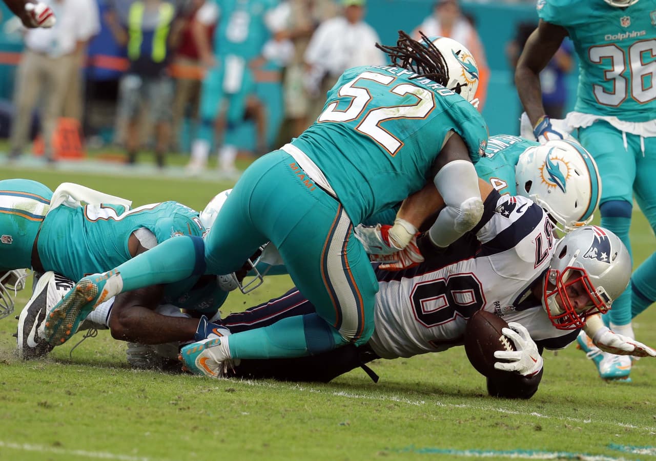 Tom Brady tuvo un mal día en Florida y los Patriots fueron derrotados 20-10 por Dolphins, y con ello la posibilidad de ser los sembrados N°1 AFC. Checa las mejores tomas de este duelo.