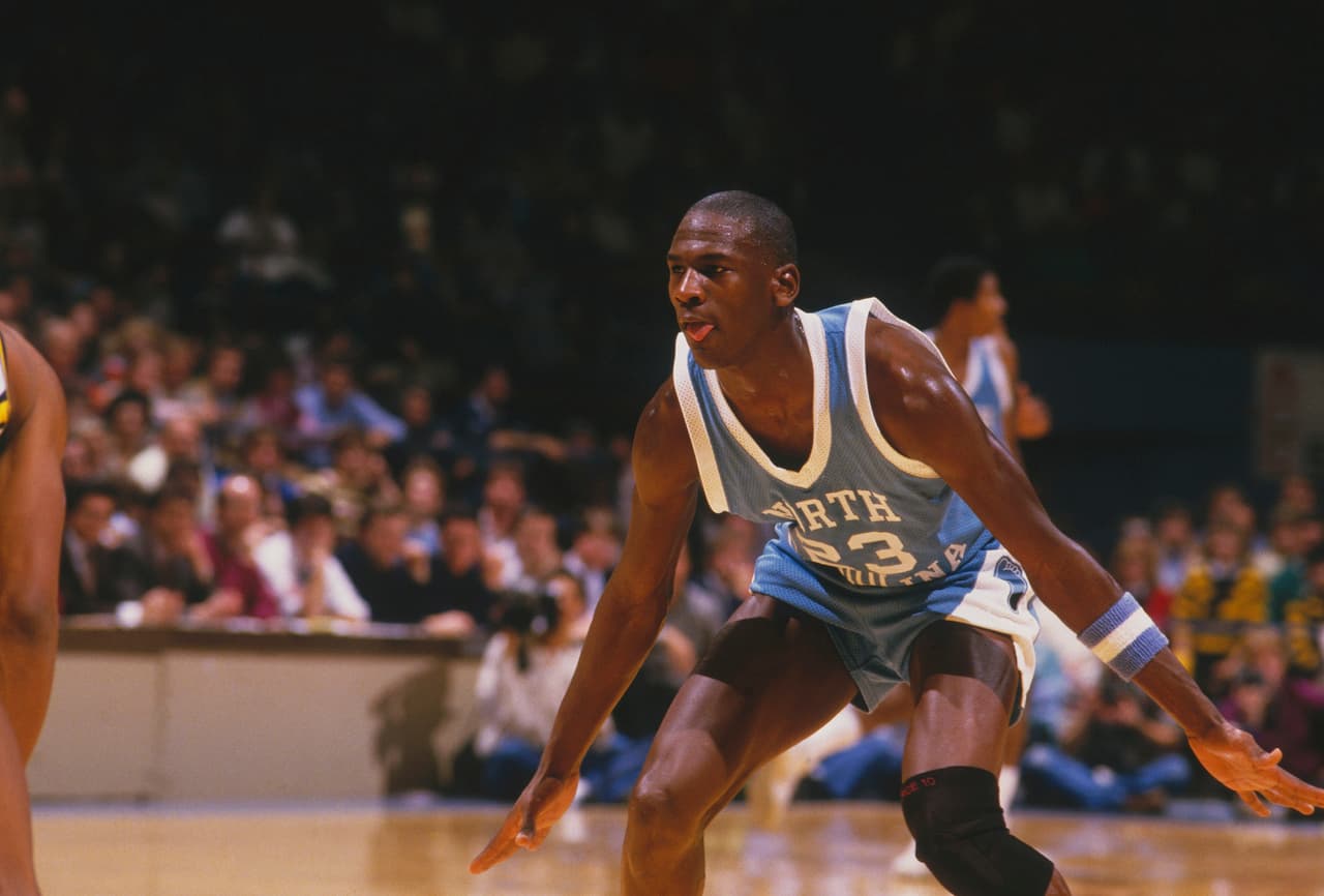 UNDATED: University of North Carolina's Michael Jordan #23 provides defence during a game. (Photo by Focus on Sport/Getty Images)