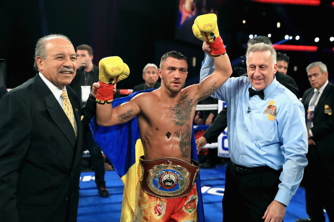 LOS ANGELES, CA - AUGUST 05: Vasyl Lomachenko of Ukraine reacts after defeatin Miguel Marriaga of Columbia by TKO in the seventh round during their WBO World Championship Junior Lightweight title fight at the Microsoft Theater on August 5, 2017 in Los Angeles, California. (Photo by Sean M. Haffey/Getty Images)