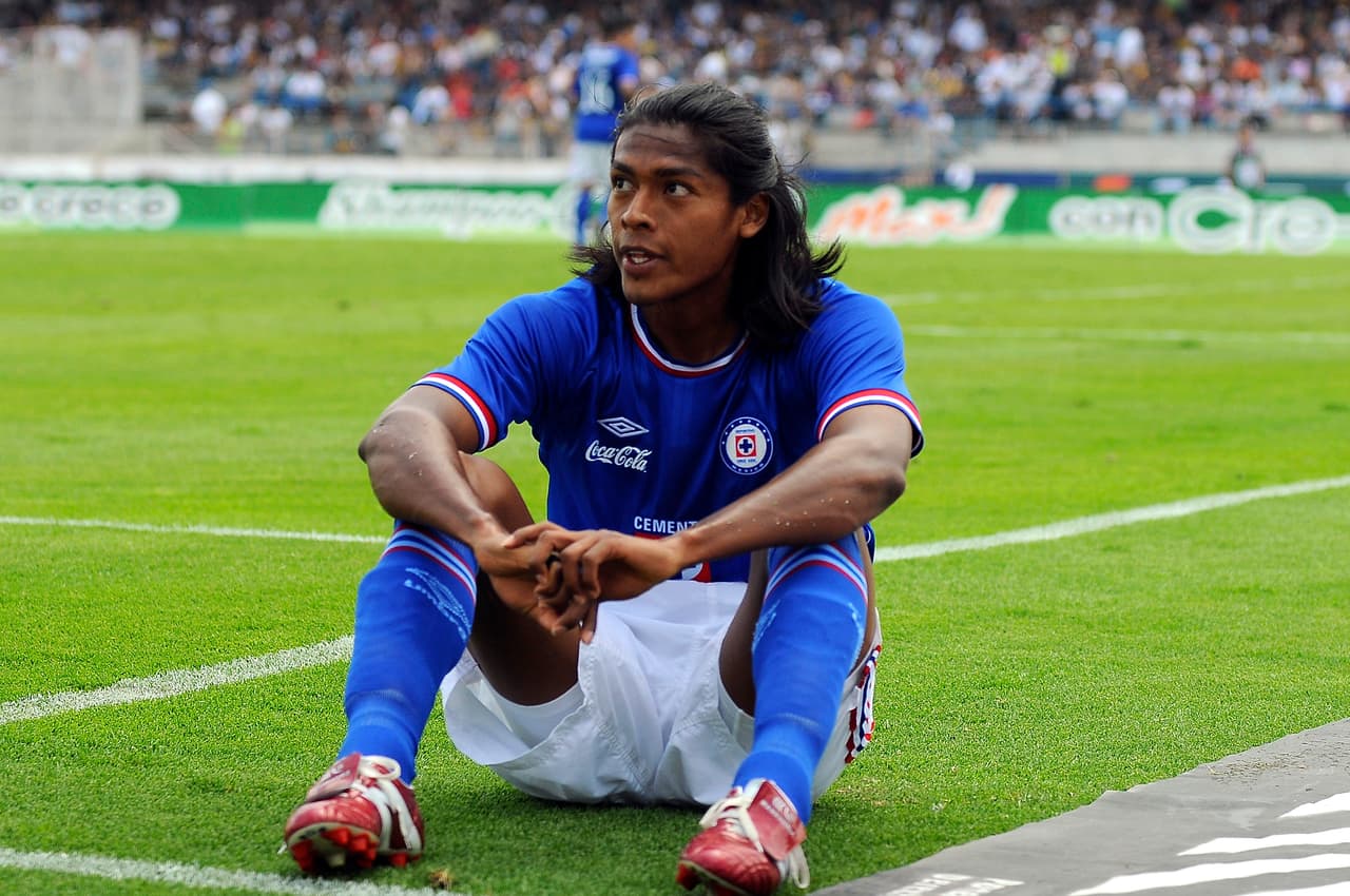 MEXICO CITY, MEXICO - AUGUST 8: Joel Huiqui of Cruz Azul reacts during a match against Cruz Azul as part of the Apertura 2010 at Olympic Stadium on August 8, 2010 in Mexico City, Mexico. (Photo by Francisco Estrada/LatinContent/Getty Images)