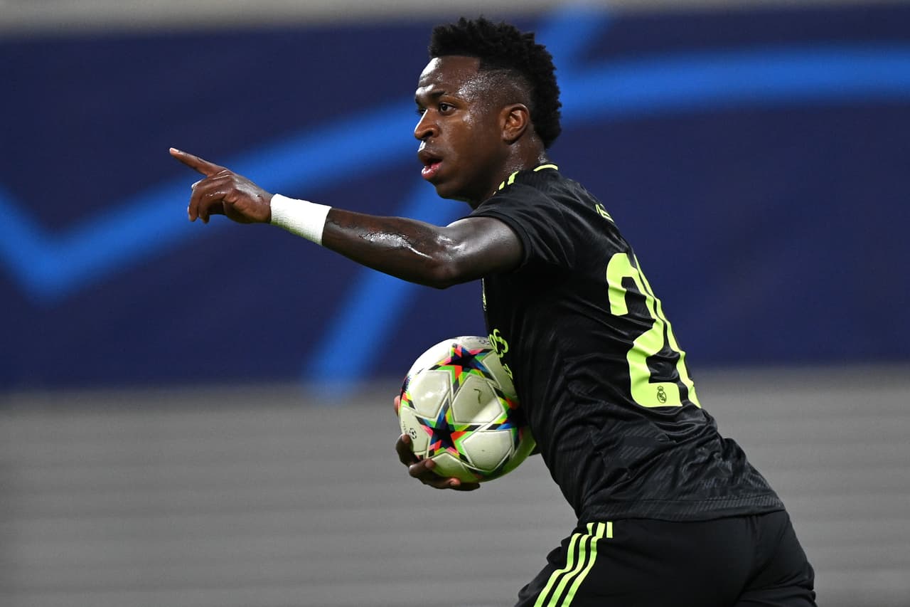 LEIPZIG, GERMANY - OCTOBER 25: Vinicius Junior of Real Madrid celebrates scoring their side's first goal during the UEFA Champions League group F match between RB Leipzig and Real Madrid at Red Bull Arena on October 25, 2022 in Leipzig, Germany. (Photo by Stuart Franklin/Getty Images)