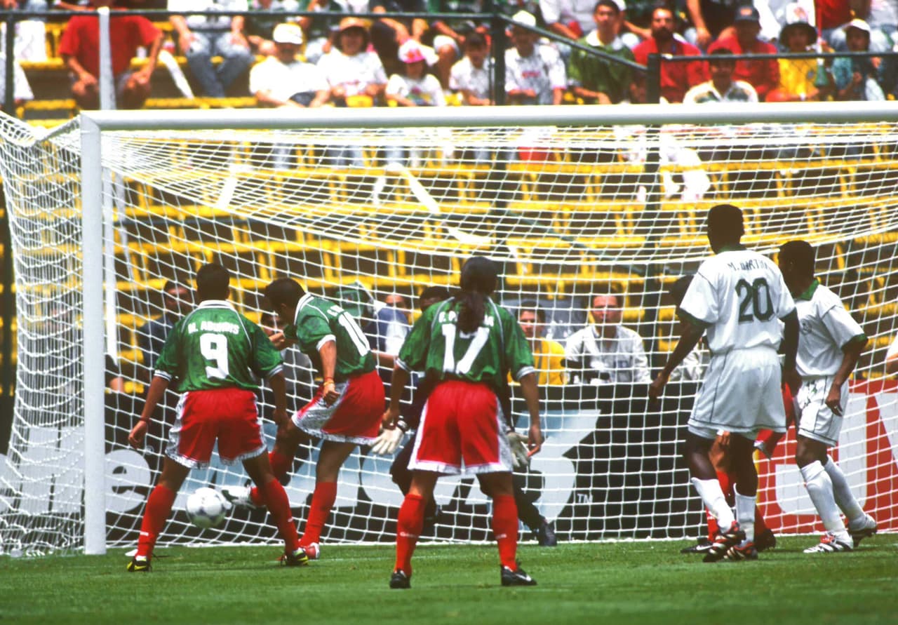 25 July 1999: CONFEDERATIONS CUP 99, photo of mexican forward Cuahtemoc Blanco (#10), scoring a goal againts Saudi Arabia, during the 5-1 victory of the mexican team in the day two game of the Confederations Cup./Foto del delantero mexicano Cuauhtemoc Blanco (#10), anotando un gol en contra de Arabia Saudita, durante la victoria de 5-1 del equipo mexicano, en juego del dia dos de la Copa Confederaciones.
