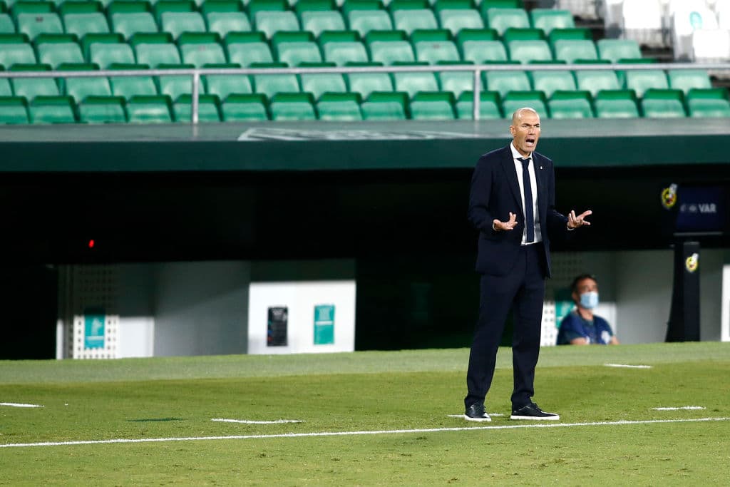 SEVILLE, SPAIN - SEPTEMBER 26: Zinedine Zidane, Head Coach of Real Madrid reacts during the La Liga Santader match between Real Betis and Real Madrid at Estadio Benito Villamarin on September 26, 2020 in Seville, Spain. Sporting stadiums in Spain remain under strict restrictions due to the Coronavirus Pandemic as Government social distancing laws prohibit fans inside venues resulting in games being played behind closed doors. (Photo by Fran Santiago/Getty Images)