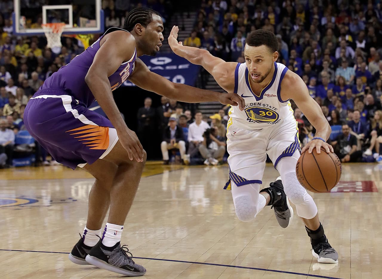 Steph Curry y Kevin Durant conducen a Warrios a paliza sobre Suns