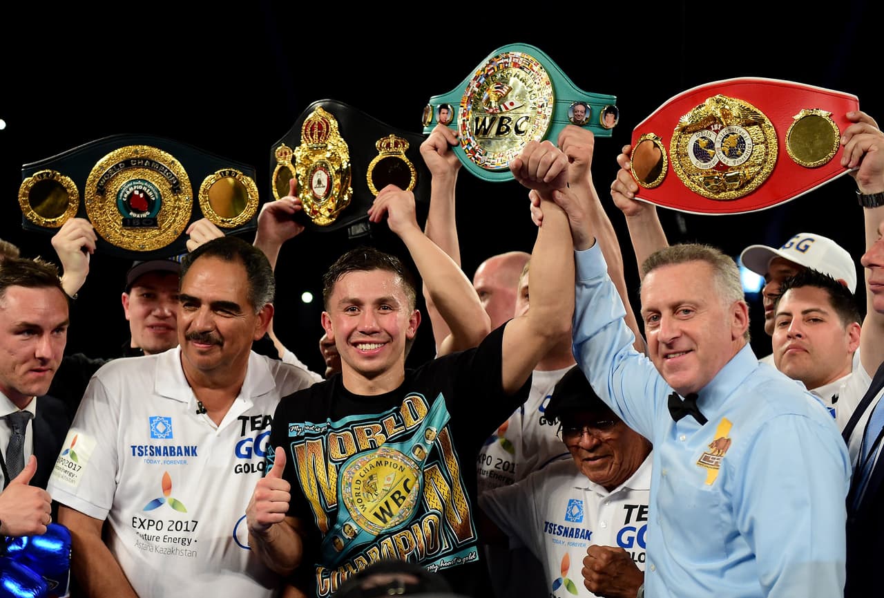 INGLEWOOD, CA - APRIL 23: Gennady Golovkin of Kazakhstan poses with his belts after his second round TKO of Dominic Wade during a unified middleweight title fight at The Forum on April 23, 2016 in Inglewood, California. (Photo by Harry How/Getty Images)