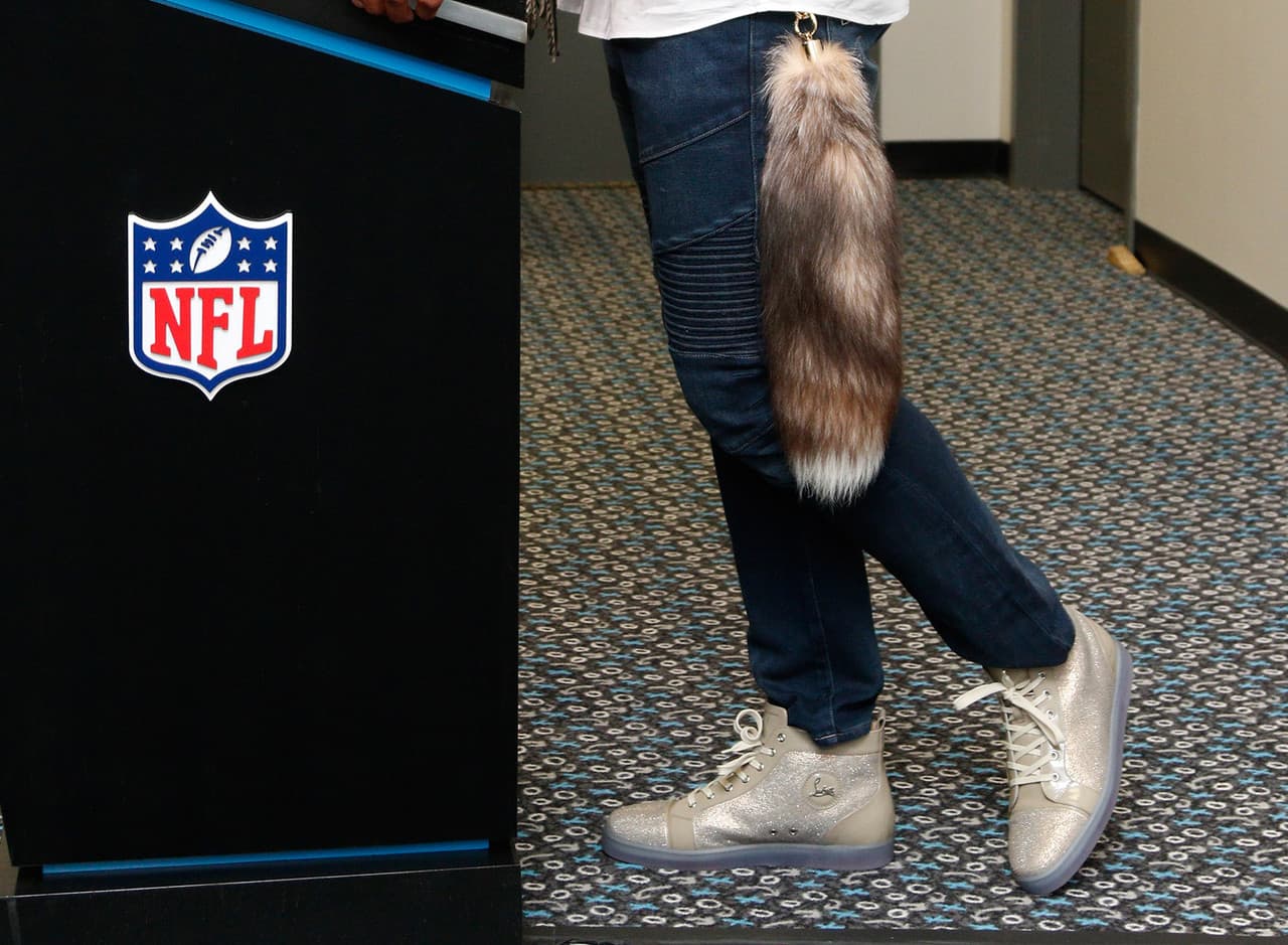 Cam Newton (después del juego): Christian Louboutin High tops.