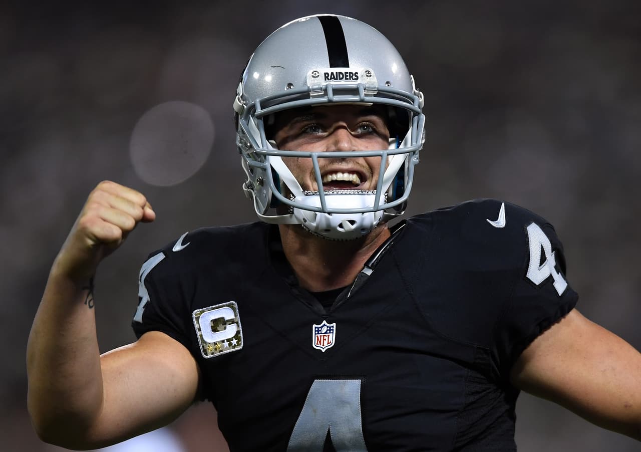 OAKLAND, CA - NOVEMBER 06: Derek Carr #4 of the Oakland Raiders celebrates after a touchdown during the fourth quarter against the Denver Broncos at Oakland-Alameda County Coliseum on November 6, 2016 in Oakland, California. (Photo by Thearon W. Henderson/Getty Images)