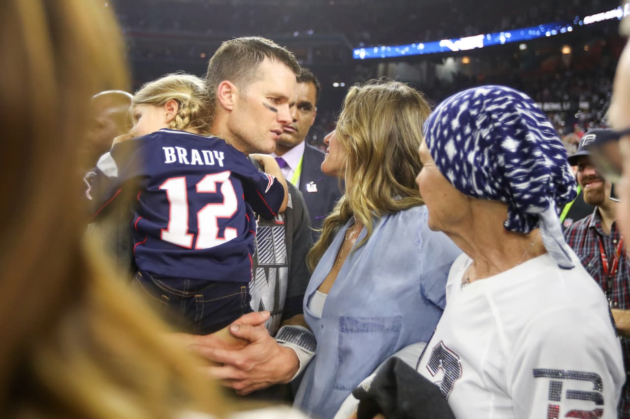 New England Patriots quarterback Tom Brady (12) celebrates with his daughter,Vivian Brady, wife Gisele Bundchen, and mother, Galynn Brady, following the Patriots' win in the NFL Super Bowl LI football game against the Atlanta Falcons at NRG Stadium on Sunday, February 5, 2017 in Houston, TX. (Ben Liebenberg via AP)