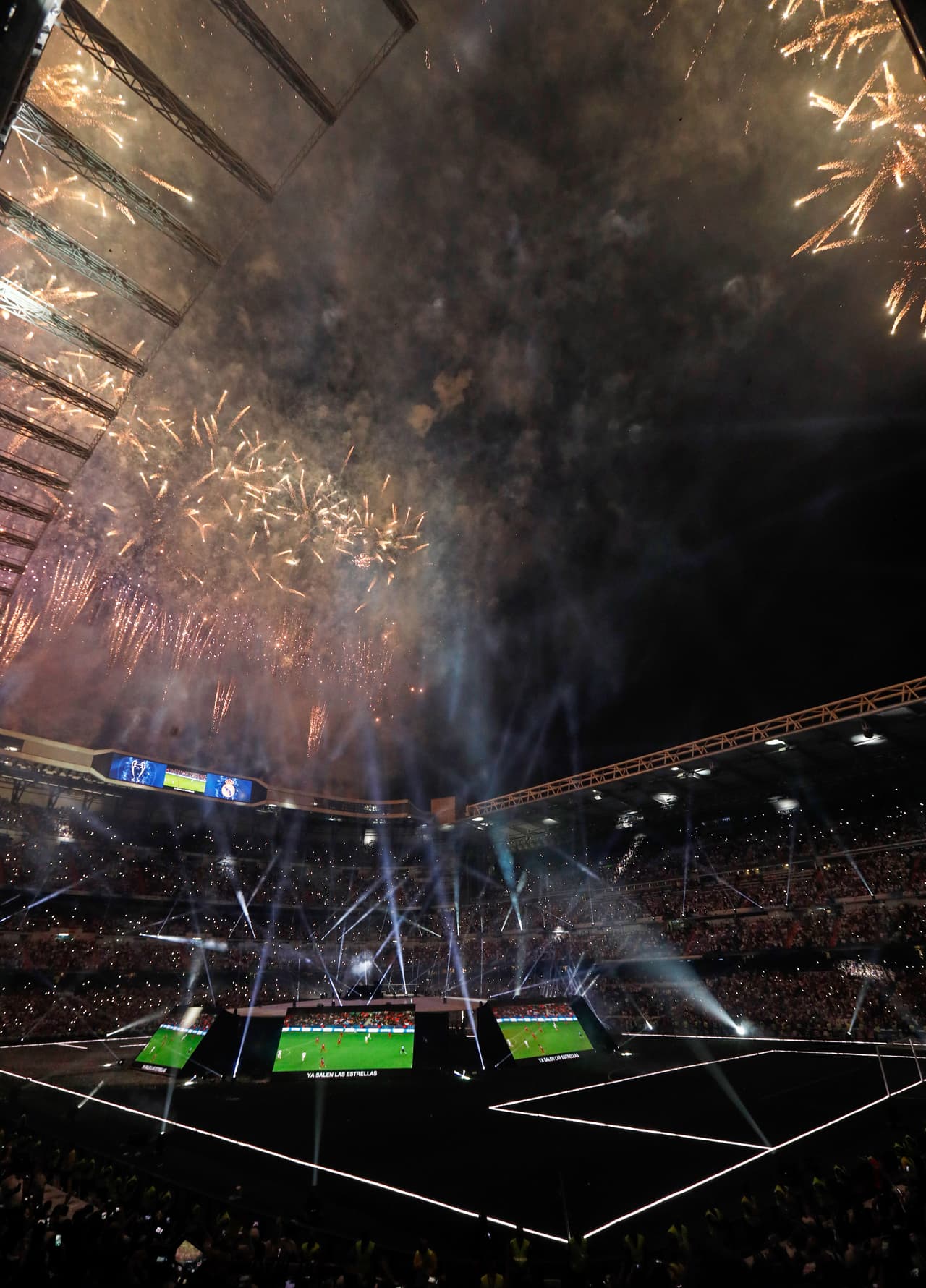 Fireworks explode off over the Santiago Bernabeu stadium during Real Madrid's celebration in Madrid on June 4, 2017 after winning the UEFA Champions League football match final Juventus vs Real Madrid CF held at the National Stadium of Wales in Cardiff on June 3, 2017. / AFP PHOTO / OSCAR DEL POZO (Photo credit should read OSCAR DEL POZO/AFP/Getty Images)