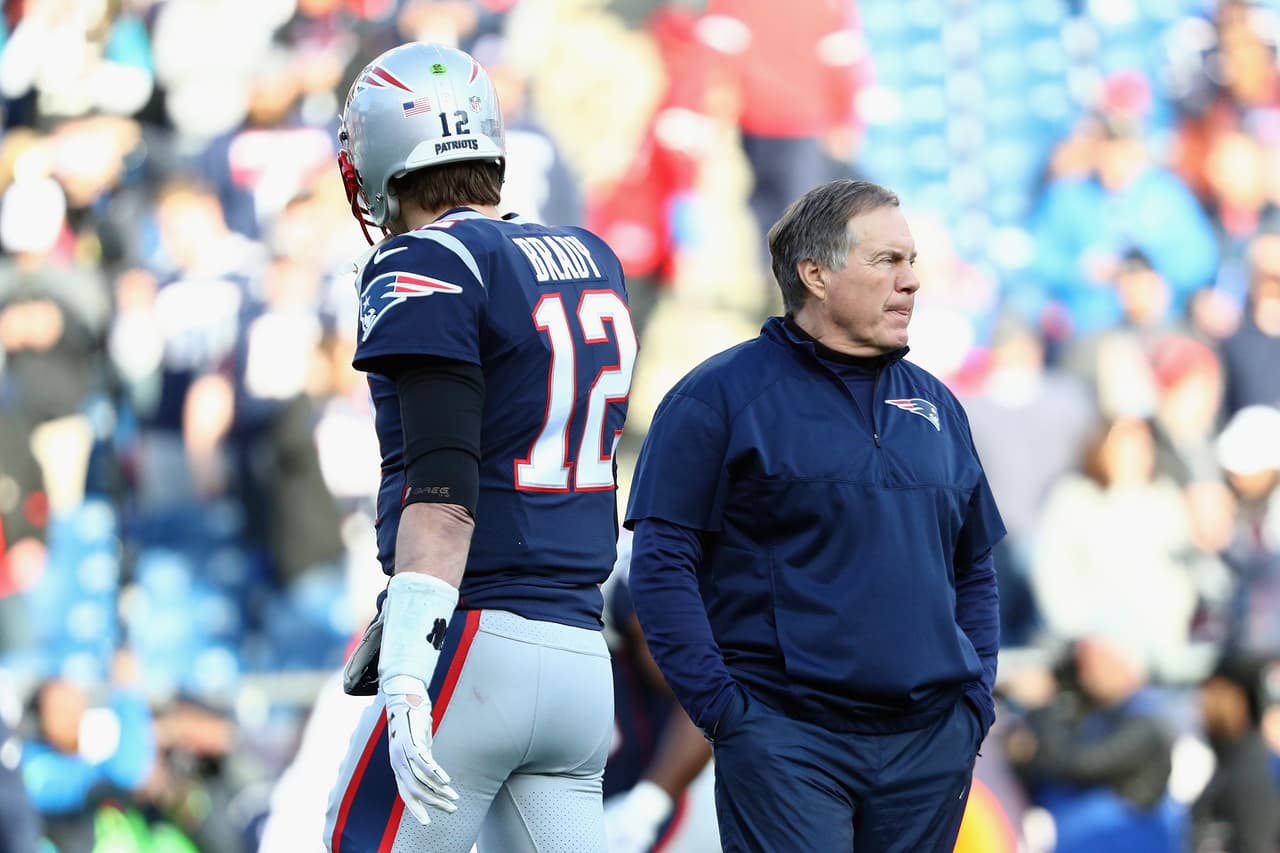 FOXBOROUGH, MA - JANUARY 21: Tom Brady #12 of the New England Patriots and head coach Bill Belichick look on during warm ups before the AFC Championship Game against the Jacksonville Jaguars at Gillette Stadium on January 21, 2018 in Foxborough, Massachusetts. (Photo by Maddie Meyer/Getty Images)