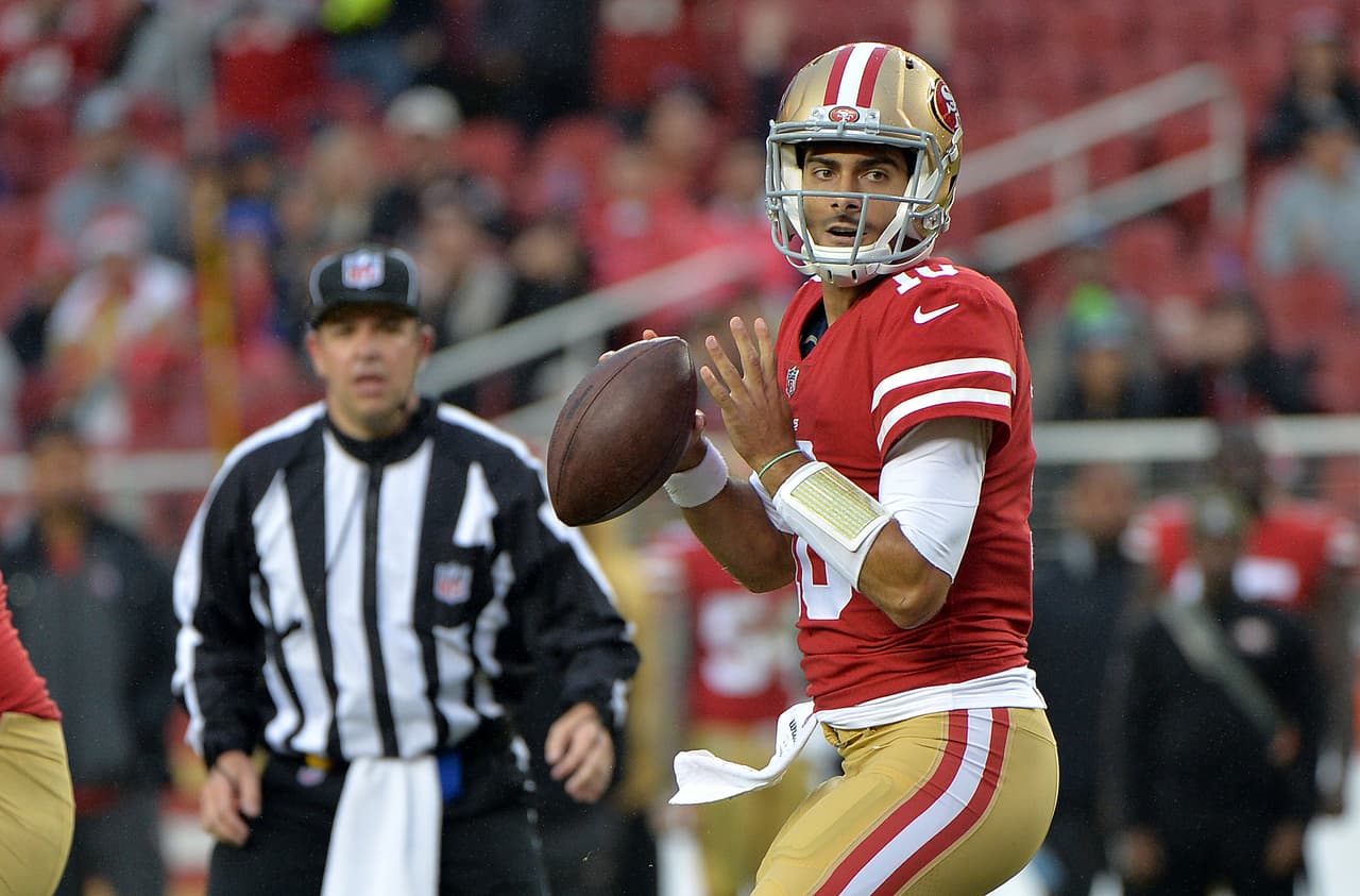 San Francisco 49ers quarterback Jimmy Garoppolo looks to throw against the San Francisco 49ers during the second half of an NFL football game Sunday, Nov. 26, 2017, in Santa Clara, Calif. (AP Photo/Don Feria)