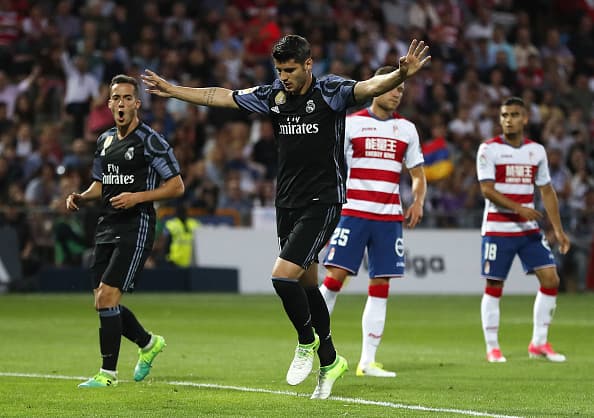 GRANADA, SPAIN - MAY 06: Alvaro Morata of Real Madrid celebrates after scoring his team's third goal during the La Liga match between Granada CF and Real Madrid CF at Estadio Nuevo Los Carmenes on May 6, 2017 in Granada, Spain. (Photo by Angel Martinez/Real Madrid via Getty Images)