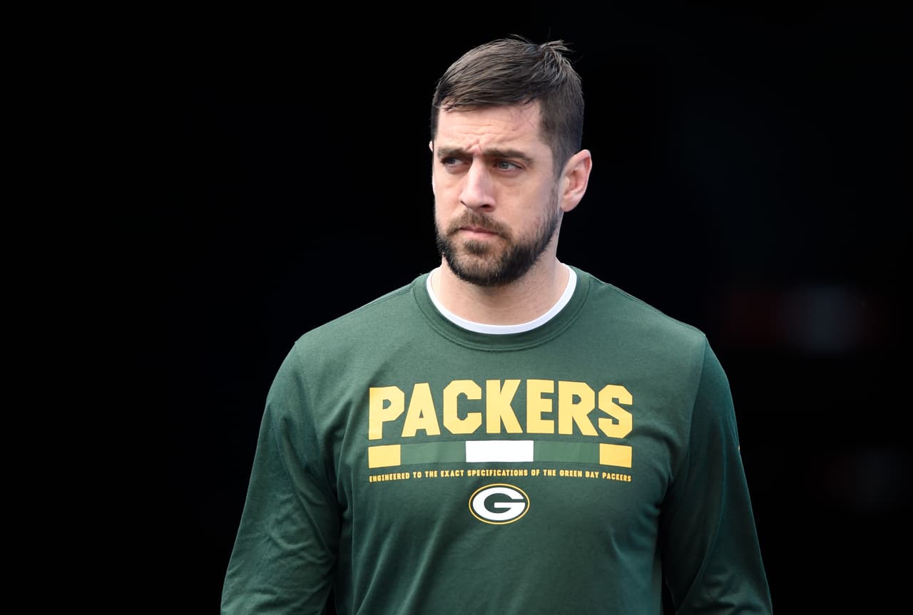 Green Bay Packers' Aaron Rodgers walks onto the field before an NFL football game against the Carolina Panthers in Charlotte, N.C., Sunday, Dec. 17, 2017. (AP Photo/Mike McCarn)