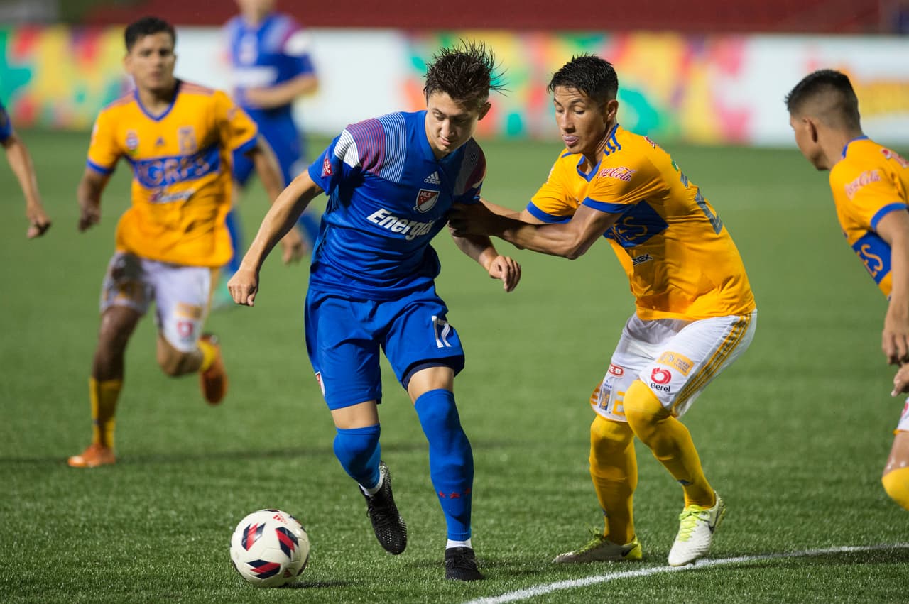 Jul 31, 2018; Marietta, GA, USA; MLS Homegrown player Ben Mines controls the ball against Tigres U-20s player Aldo Mota (284) at Childrens Healthcare of Atlanta Training Ground. Mandatory Credit: John David Mercer-USA TODAY Sports