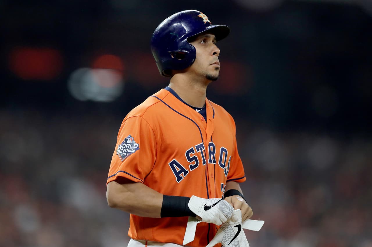 HOUSTON, TEXAS - OCTOBER 30: Michael Brantley #23 of the Houston Astros draws a walk against the Washington Nationals during the first inning in Game Seven of the 2019 World Series at Minute Maid Park on October 30, 2019 in Houston, Texas. (Photo by Elsa/Getty Images)