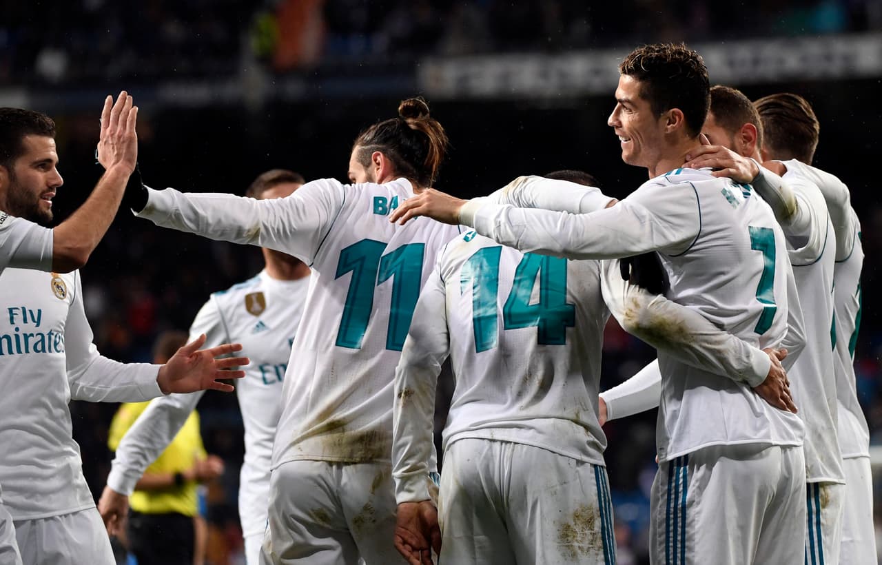 Real Madrid venció 3-1 a Getafe y llegó a 54 puntos en la Liga de España, donde se mantiene en el tercer lugar pero aún lejos del Barcelona.
