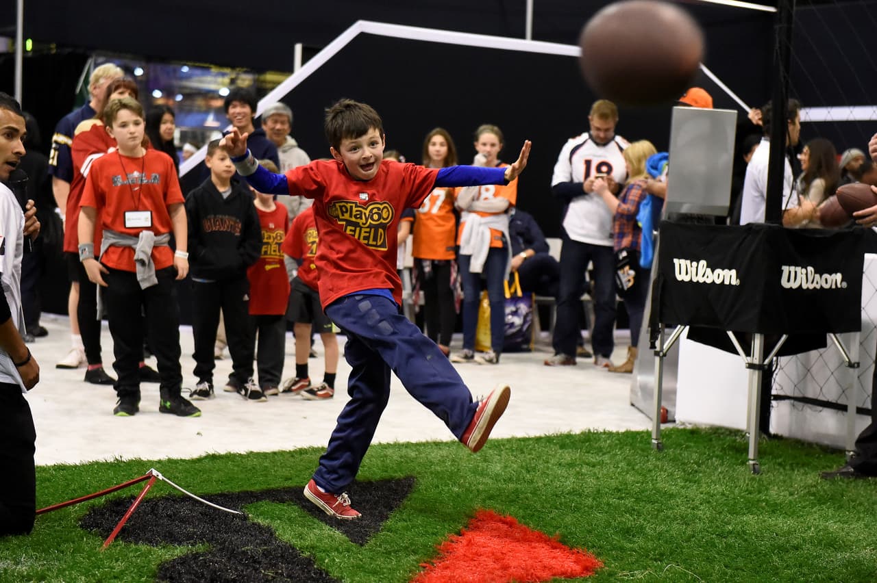 Thursday, February 4, 2016: Fans enjoy the sights and attractions at the Super Bowl 50, NFL Experience, in San Francisco, California. Eric Canha/CSM (Cal Sport Media via AP Images)
