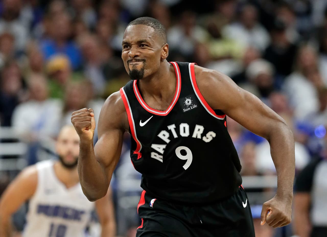 Toronto Raptors' Serge Ibaka reacts after making a basket against the Orlando Magic during the second half in Game 3 of a first-round NBA basketball playoff series, Friday, April 19, 2019, in Orlando, Fla. (AP Photo/John Raoux)