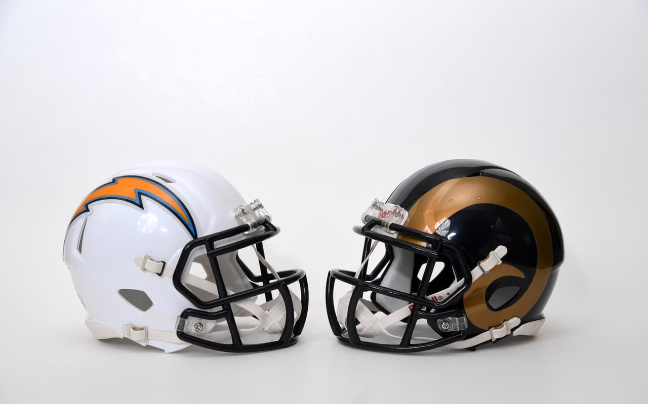General overall view of Los Angeles Chargers and Los Angeles Rams helmets. Chargers owner Dean Spanos has exercised his option to relocate the franchise from San Diego to Los Angeles for the 2017 season. The Chargers will play the 2017 and 2018 seasons at the StubHub Center before joining the Los Angeles Rams and owner Stan Kroenke (not pictured) at the L.A. Stadium and Entertainment District at Hollywood Park in Inglewood in 2019. (Kirby Lee/NFL)