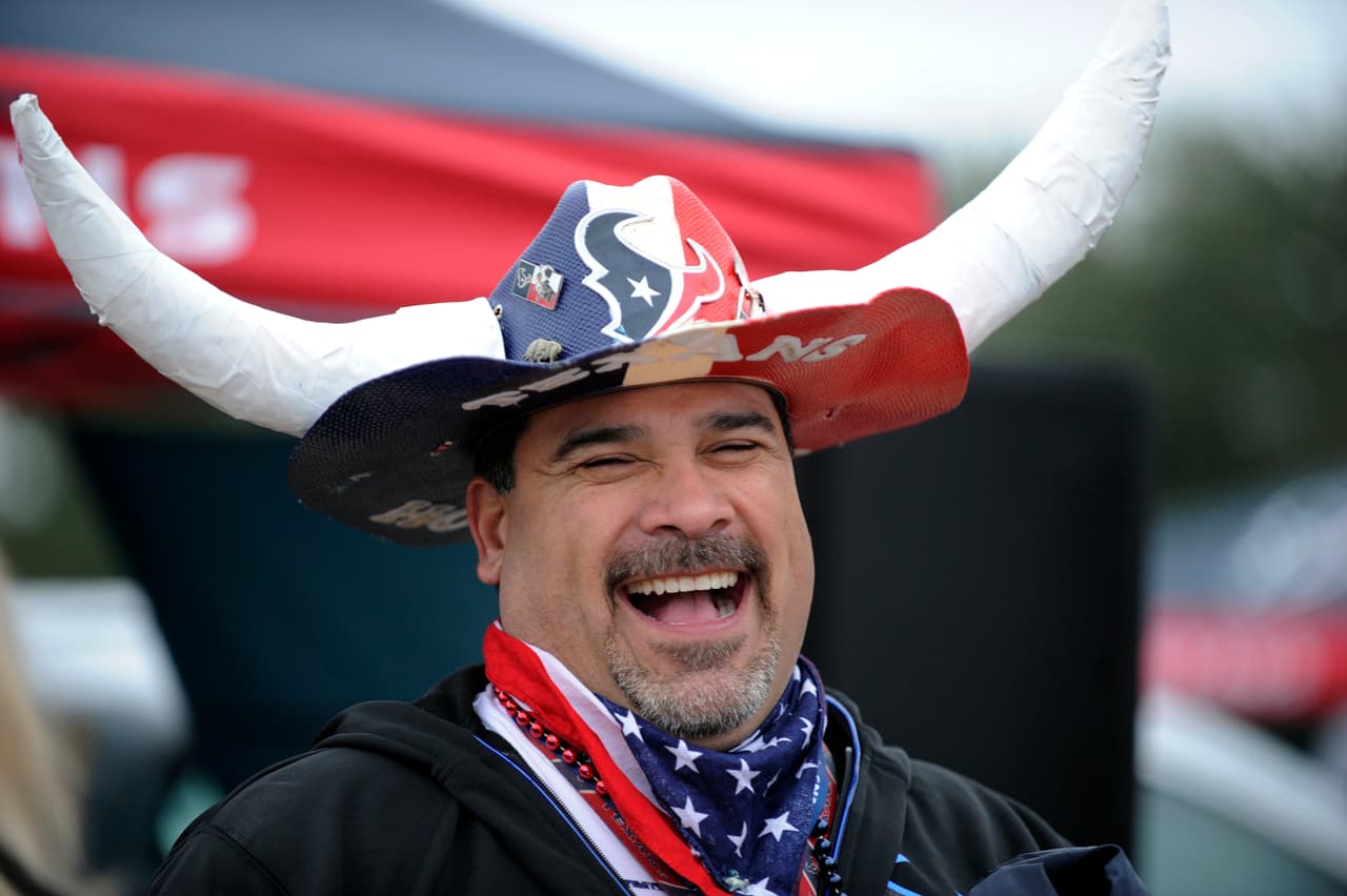 Sin duda hay felicidad en este fanático de los Houston Texans por el título divisional en la AFC.