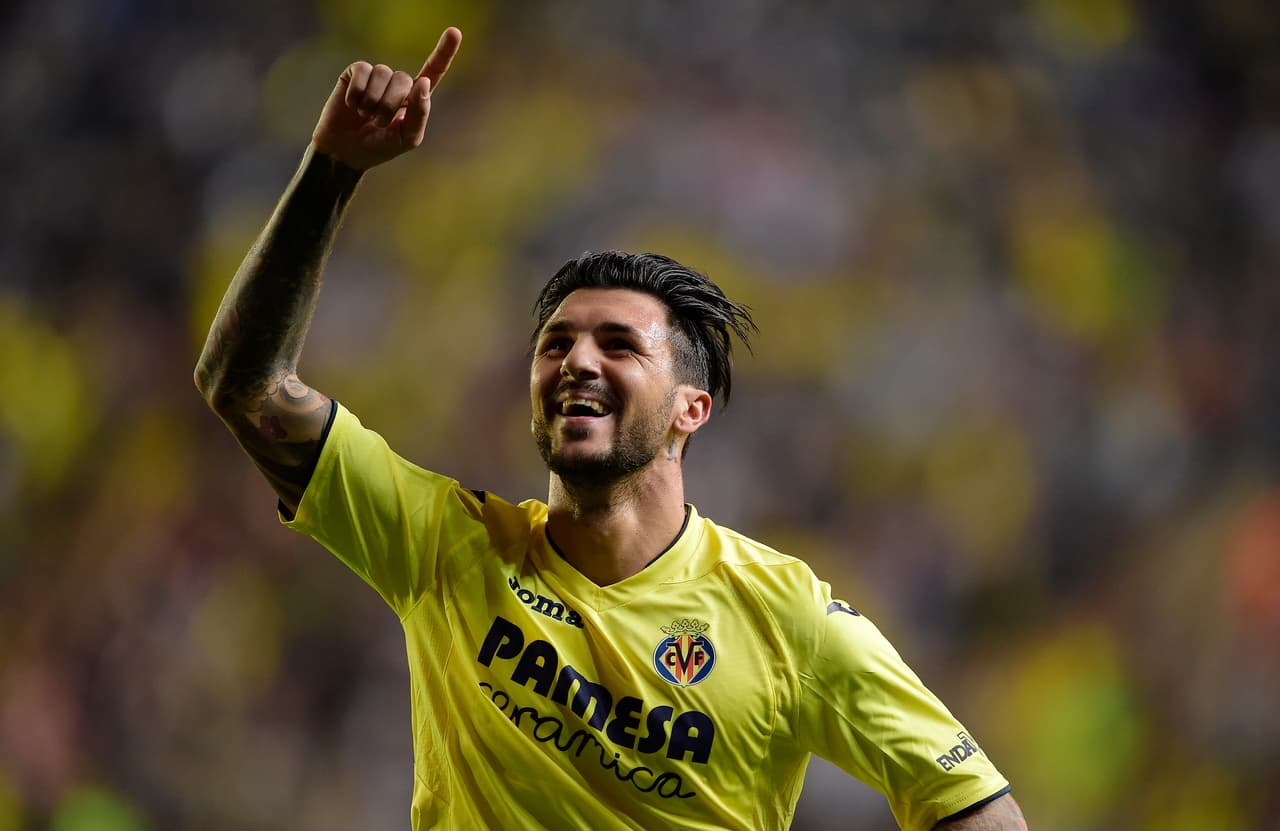 Villarreal's Italian midfielder Roberto Soriano celebrates after scoring his second goal during the Spanish league football match Villarreal CF vs RC Celta de Vigo at El Madrigal stadium in Vila-real on October 16, 2016. / AFP / JOSE JORDAN (Photo credit should read JOSE JORDAN/AFP/Getty Images)