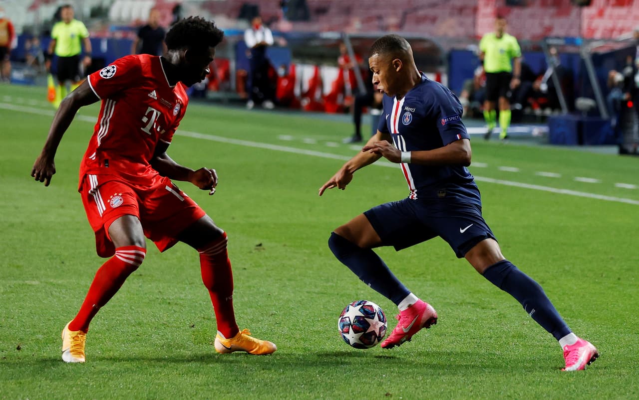 Bayern Munich's Canadian midfielder Alphonso Davies (L) fights for the ball with Paris Saint-Germain's French forward Kylian Mbappe during the UEFA Champions League final football match between Paris Saint-Germain and Bayern Munich at the Luz stadium in Lisbon on August 23, 2020. (Photo by MATTHEW CHILDS / POOL / AFP) (Photo by MATTHEW CHILDS/POOL/AFP via Getty Images)