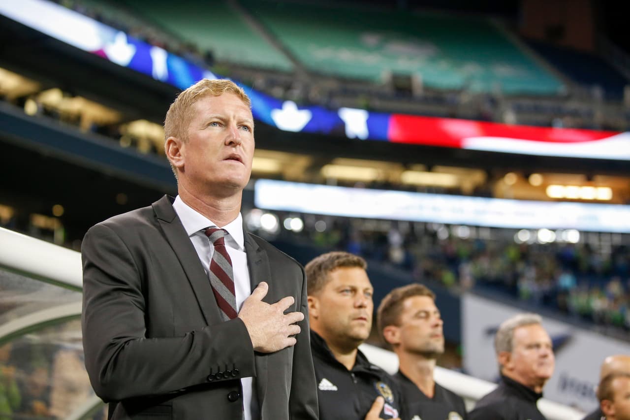 Sep 19, 2018; Seattle, WA, USA; Philadelphia Union head coach Jim Curtin stands during the national anthem before a game against the Seattle Sounders FC at CenturyLink Field. Mandatory Credit: Joe Nicholson-USA TODAY Sports