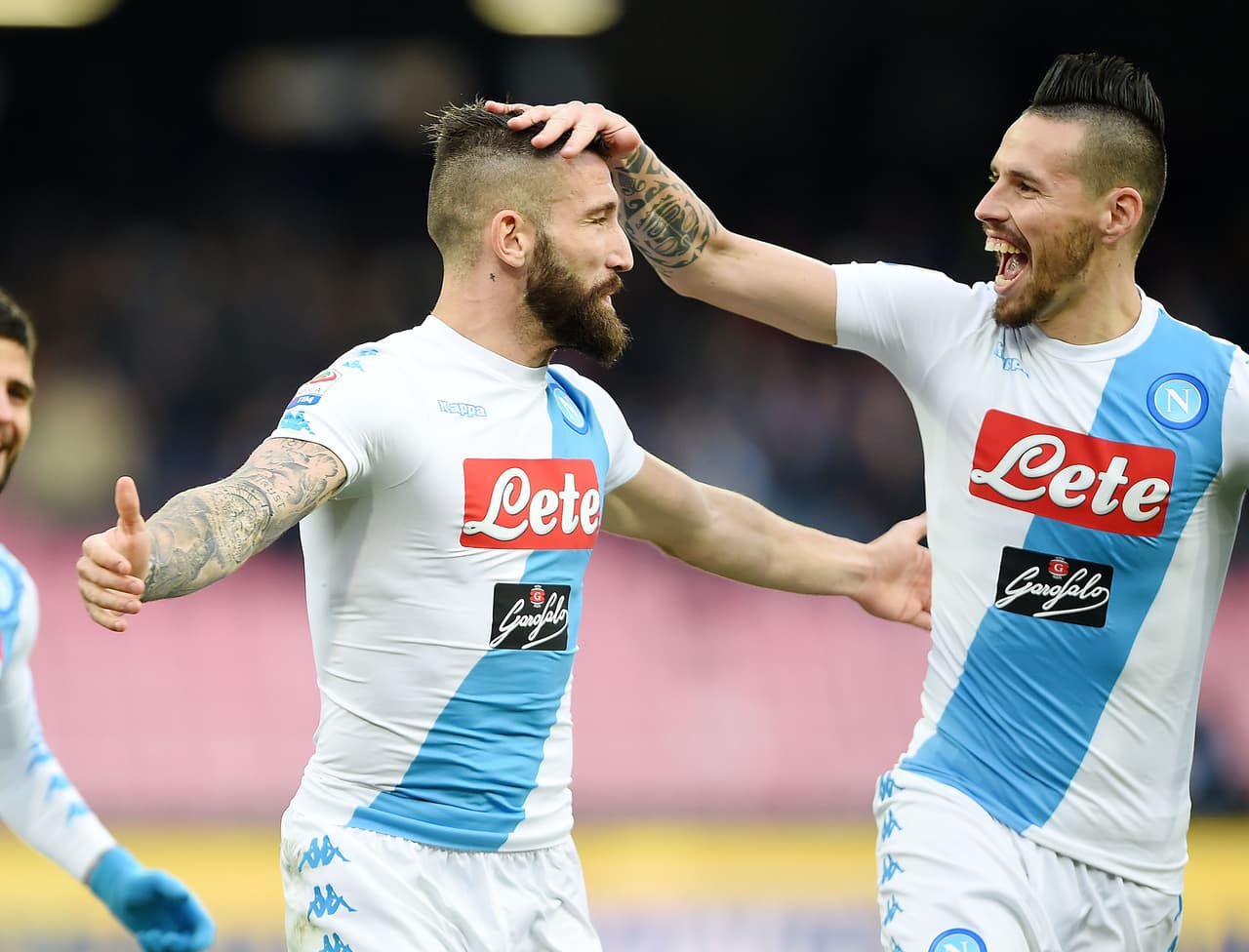 NAPLES, ITALY - JANUARY 15: Marek Hamsik and Lorenzo Tonelli of SSC Napoli celebrate the 1-0 goal scored by Lorenzo Tonelli during the Serie A match between SSC Napoli and Pescara Calcio at Stadio San Paolo on January 15, 2017 in Naples, Italy. (Photo by Francesco Pecoraro/Getty Images)