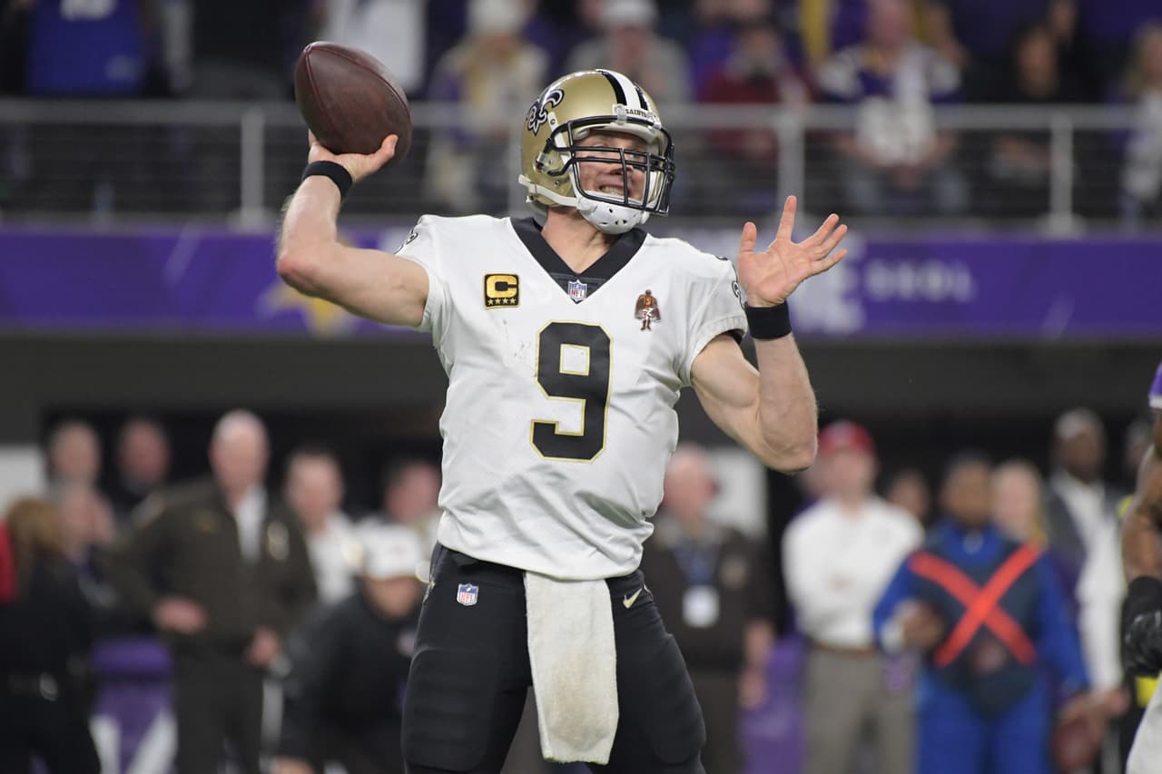 New Orleans Saints quarterback Drew Brees (9) throws a pass against the New Orleans Saints during an NFC Divisional playoff game in Minneapolis, Sunday, Jan. 14, 2018. The Vikings defeated the Saints 27-23. (Kirby Lee via AP)