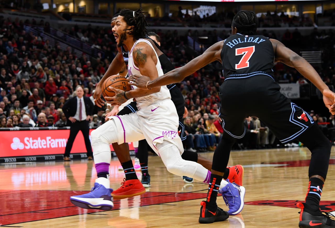 Derrick Rose (izquierda) se encargó de sepultar a los Chicago Bulls con 24 puntos, tres rebotes y ocho asistencias en la victoria de Minnesota Timberwolves 119-94.