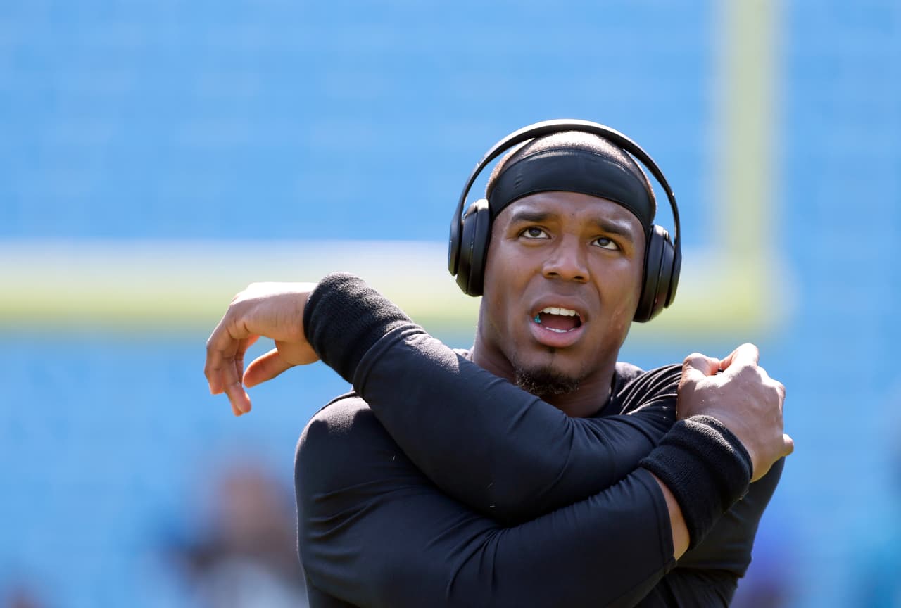 Carolina Panthers' Cam Newton stretches during warm-ups before an NFL football game against the Minnesota Vikings in Charlotte, N.C., Sunday, Sept. 18, 2016. The Vikings won 22-10. (AP Photo/Bob Leverone)