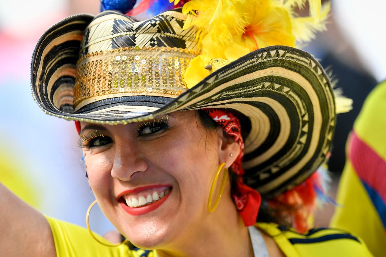 A Colombian fan waits for the start of the group H match between Senegal and Colombia, at the 2018 soccer World Cup in the Samara Arena in Samara, Russia, Thursday, June 28, 2018. (AP Photo/Martin Meissner)