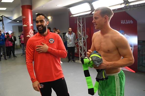 KAZAN, RUSSIA - JUNE 22: Claudio Bravo of Chile and Marc-Andre ter Stegen of Germany share a joke after the FIFA Confederations Cup Russia 2017 Group B match between Germany and Chile at Kazan Arena on June 22, 2017 in Kazan, Russia. (Photo by Michael Regan - FIFA/FIFA via Getty Images)