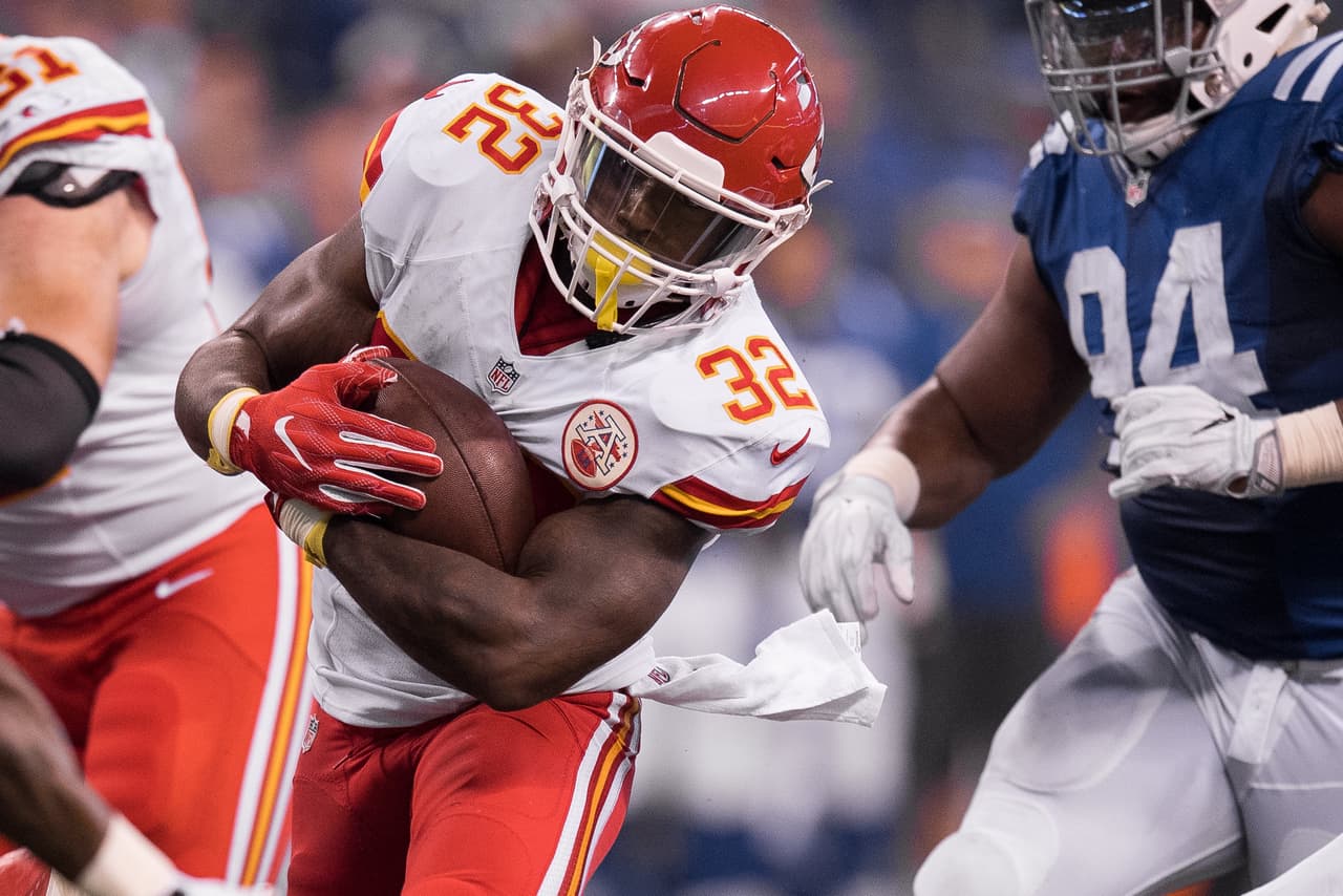 Kansas City Chiefs running back Spencer Ware (32) carries the ball up the middle during the NFL game between the Kansas City Chiefs and Indianapolis Colts on October 30, 2016, at Lucas Oil Stadium in Indianapolis, IN.