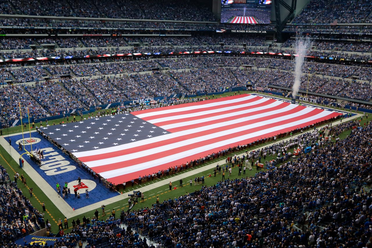 The American Flag is displayed during the National Anthem before an NFL football game between the Indianapolis Colts and the Detroit Lions in Indianapolis, Sunday, Sept. 11, 2016. (AP Photo/R Brent Smith)