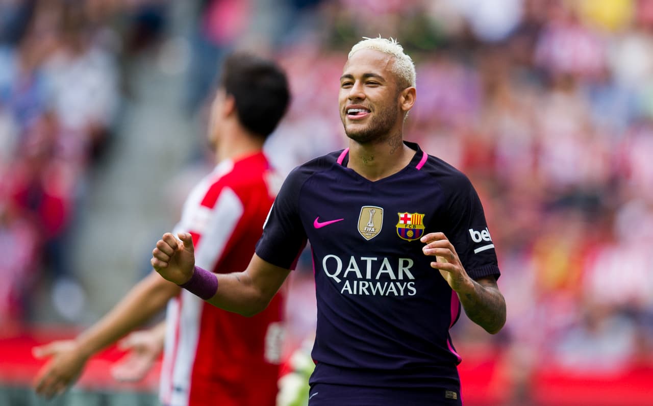 GIJON, SPAIN - SEPTEMBER 24: Neymar of FC Barcelona celebrates after scoring his team's third goal during the La Liga match between Real Sporting de Gijon and FC Barcelona at Estadio El Molinon on September 24, 2016 in Gijon, Spain. (Photo by Juan Manuel Serrano Arce/Getty Images)