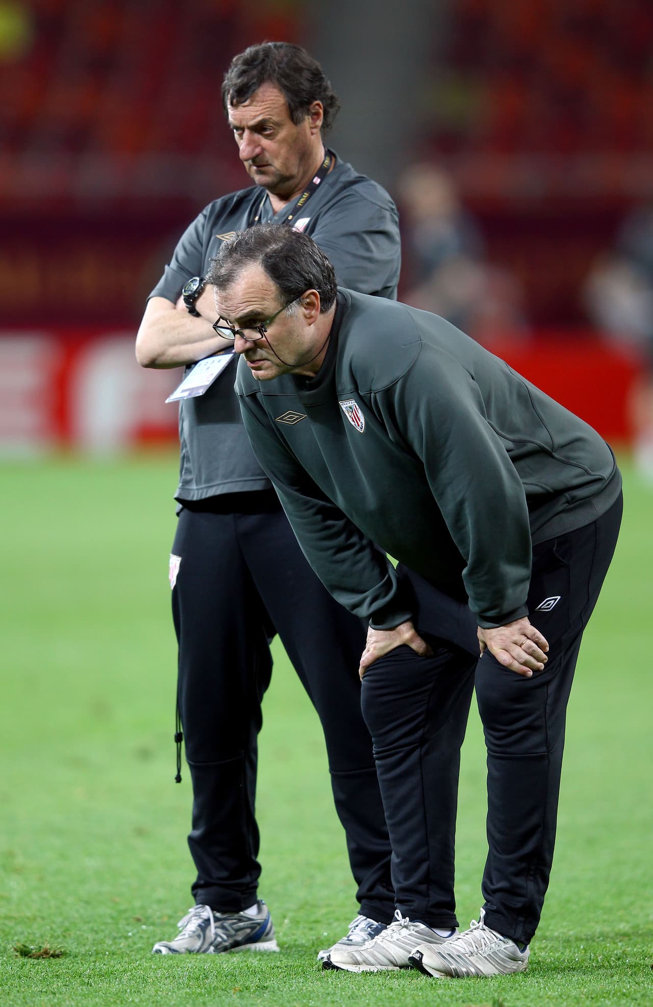 BUCHAREST, ROMANIA - MAY 08: Athletic Bilbao coach Marcelo Bielsa looks on with physical coach Luis Bonini during the Athletic Bilbao training session ahead of the UEFA Europa League Final between Atletico Madrid and Athletic Bilbao at the National Arena on May 8, 2012 in Bucharest, Romania. (Photo by Alex Grimm/Getty Images)
