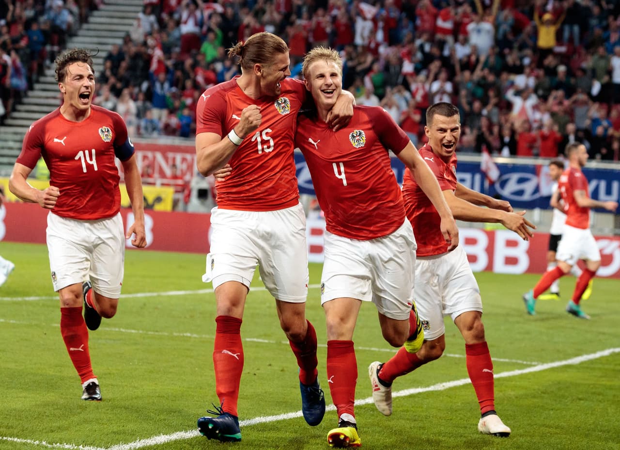 Austria's defender Martin Hinteregger (R) celebrate scoring with his teammate defender Sebastian Proedl during the international friendly footbal match Austria v Germany in Klagenfurt, Austria, on June 2, 2018. (Photo by Johann GRODER / APA / AFP) / Austria OUT (Photo credit should read JOHANN GRODER/AFP/Getty Images)