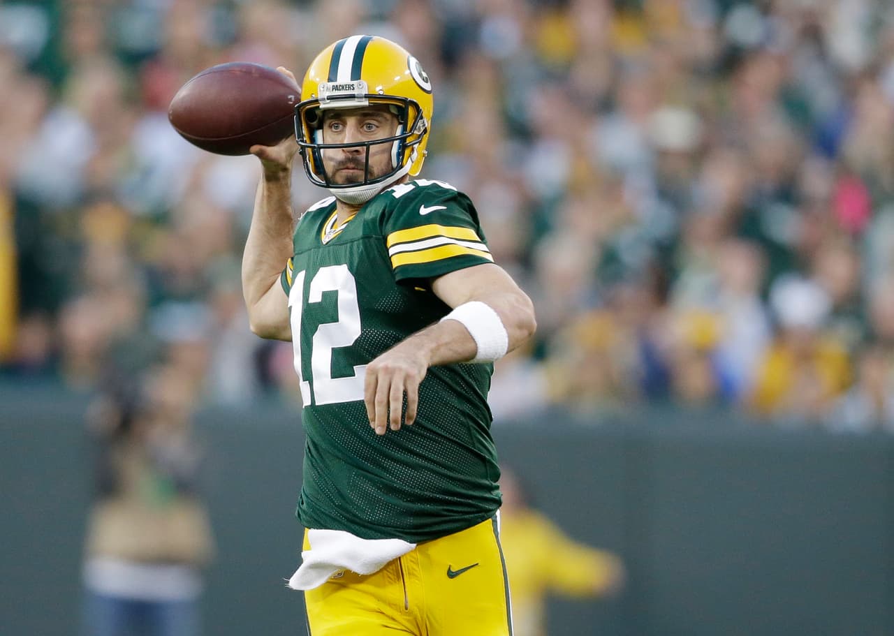 Green Bay Packers' Aaron Rodgers throws during the first half of an NFL football game against the Indianapolis Colts Sunday, Nov. 6, 2016, in Green Bay, Wis. (AP Photo/Jeffrey Phelps)