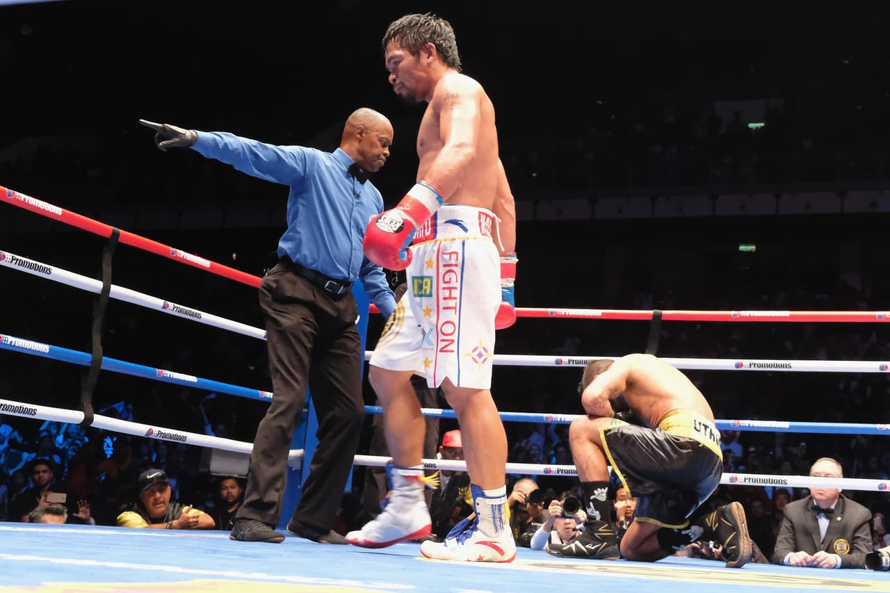 KUALA LUMPUR, MALAYSIA - JULY 15: Manny Pacquiao of the Phillipines and Lucas Matthysse of Argintine in action on July 15, 2018 in Kuala Lumpur, Malaysia. (Photo by How Foo Yeen/Getty Images)