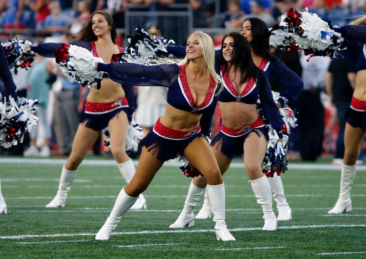 New England Patriots cheerleaders perform before a preseason NFL football game between the Patriots and the Philadelphia Eagles, Thursday, Aug. 16, 2018, in Foxborough, Mass. (AP Photo/Mary Schwalm)