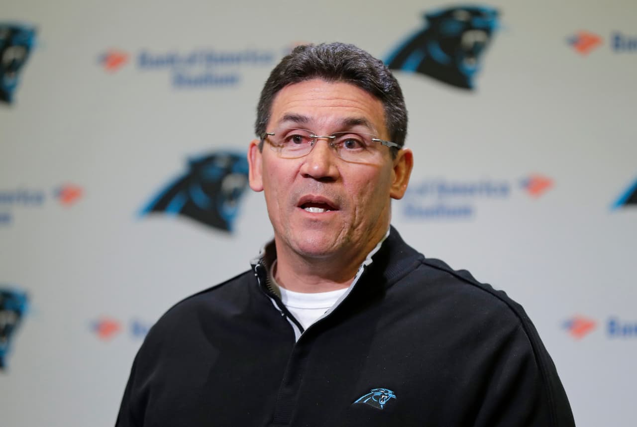 Carolina Panthers head coach Ron Rivera speaks during a news conference in Charlotte, N.C., Tuesday, Jan. 9, 2018. The Panthers have fired offensive coordinator Mike Shula and quarterbacks coach Ken Dorsey two days after a playoff loss to the New Orleans Saints. (AP Photo/Chuck Burton)