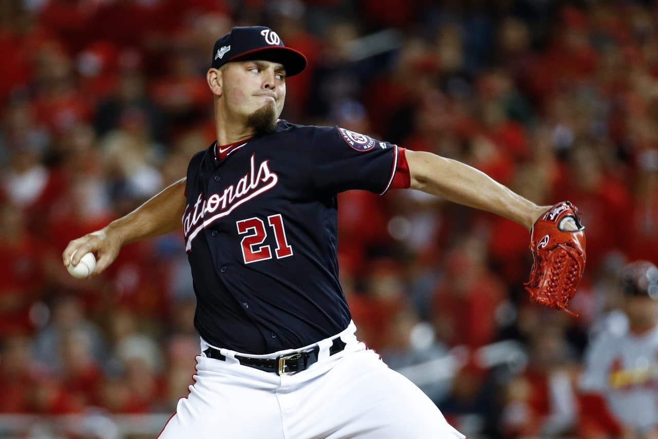 Washington Nationals relief pitcher Tanner Rainey throws during the ninth inning of Game 3 of the baseball National League Championship Series against the St. Louis Cardinals Monday, Oct. 14, 2019, in Washington. (AP Photo/Patrick Semansky)
