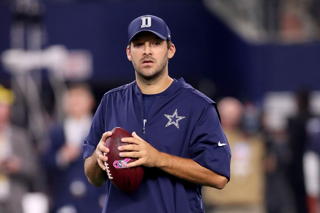 Tony Romo, Vaqueros de Dallas, se quedó fuera en diciembre 2013 por una lesión en la espalda baja.