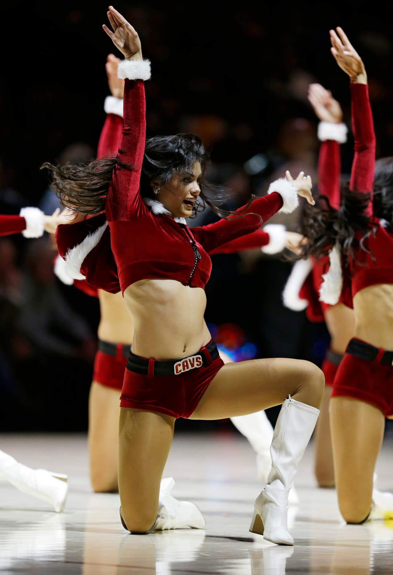 A Cleveland Cavaliers cheerleader performs in the second half of an NBA basketball game between the Golden State Warriors and the Cleveland Cavaliers, Sunday, Dec. 25, 2016, in Cleveland. (AP Photo/Tony Dejak)